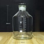 Wide-mouth-bottle-clear-glass-graduated-60-ml-to-20.000-20.000-ml-1.jpg